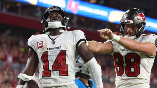 Dec 3, 2023; Tampa, Florida, USA; Tampa Bay Buccaneers wide receiver Chris Godwin (14) celebrates after he scored a touchdown against the Carolina Panthers during the second half at Raymond James Stadium.